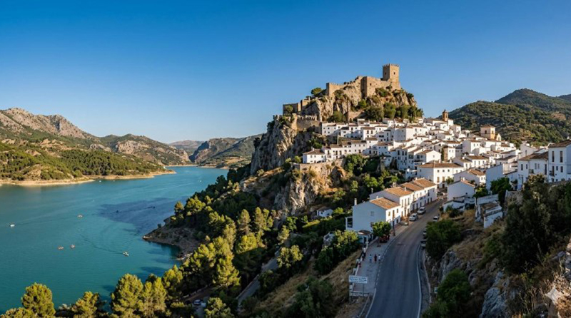 Aerial panoramic view of Zahara de la Sierra white village in Spain